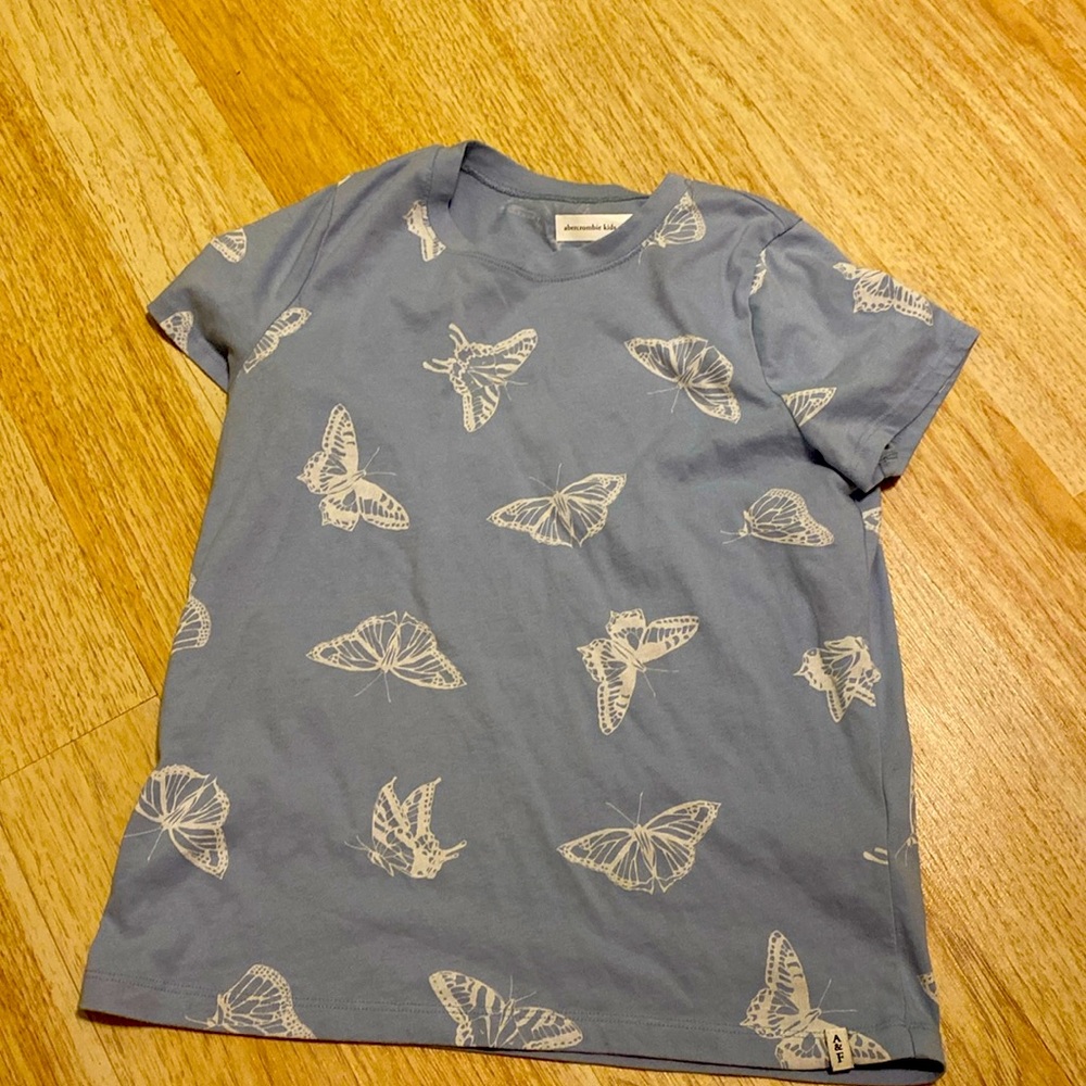 Abercrombie kids 13/14 size. Baby blue shirt with butterfly's. Cotton.